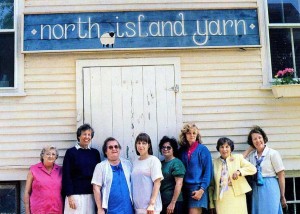 North Island Yarn employees posing in front of building