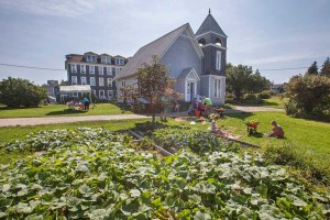 A garden flourishes in the shadow of the island church