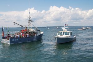 people on lobster boats