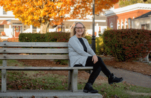Nancy Minott sitting on a bench