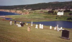 graves on the side of a hill in Grand Manan Island, New Brunswick, Canada.