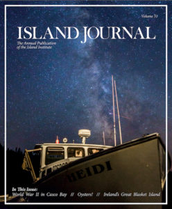 Island Journal magazine cover featuring lobsterboat shot in front of milky way