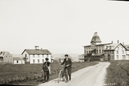 old photo of boys walking on island