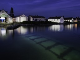boathouses photographed at night