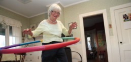 smiling old woman hola hooping