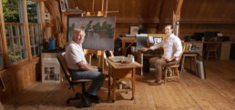 old man and son in artist studio